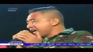 An Indonesian Soldier singing a song She's Gone