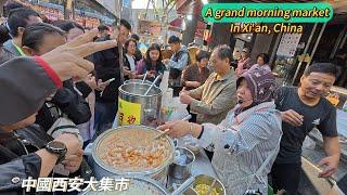 A huge morning market in Xi'an, China, with customers rushing to buy street food, a lively scene/4k