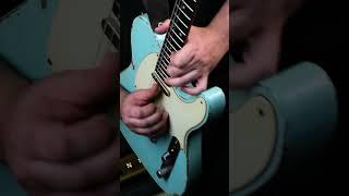 playing the blues in the style of David Levi 