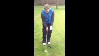 How to play golf ball lodged against the fringe of the green