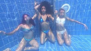3 beautiful girls underwater breath hold cheeks puff