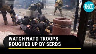 U.S.-led NATO troops chased, beaten with sticks by Serbs in Kosovo | Dramatic Footage Goes Viral
