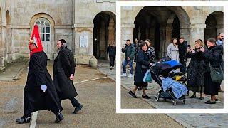 IDIOT MOCKS THE KING'S GUARD AS HIS FAMILY LAUGH at his silly walk at Horse Guards!