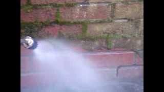 Expert Jet Washing moss off a wall by Nutech Cleaning