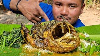 EATING  FISH  CURRY WITH  GREEN  CHILLI