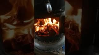 Wood samovar tea in the rain