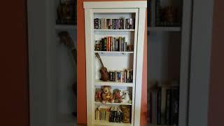 Murphy Door Hidden bookcase door with book latch