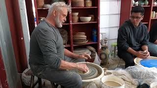 Teaching a pottery wheel class to beginners