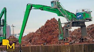 Giants of scrapyard Sennebogen 875E huge  material handler loading scrap metal with giant grapple