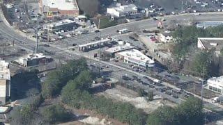 Live chopper video | Police presence at QT gas station in Smyrna, Georgia; manhunt underway