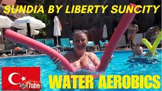 Sundia By Liberty Suncity Water Aerobics poolside exercise..