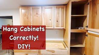 How to Hang Kitchen Cabinets! || DIY kitchen Cabinets!