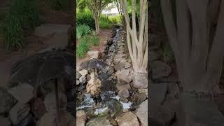 Little Girl With Umbrella At Waterfalls