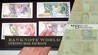 Banknote World unpacking mail