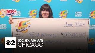 Winner $552M lotto claims prize