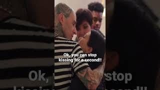 Kourtney Kardashian and Travis Barker kissing in front of Kriss Jenner 
