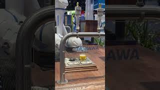 Robot serving Modelo at Yaskawa booth at Automate 2024