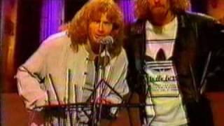 Dave Mustaine presenting an award in 1995....