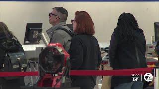 Holiday travel crunch continues, American Airlines ground stop lifted