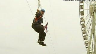 Boris Johnson gets stuck on a zip wire in London's Victoria Park