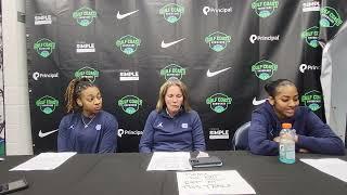 UNC's Kayla McPherson, Courtney Banghart and Deja Kelly after the Heels' loss to Kansas State