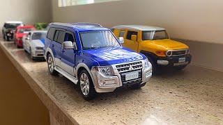 Diecast Cars Driven By Hand On Windowsill