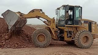 caterpillar 938G wheel Loader working hard at the crush plant. trained operator Smart Work performed