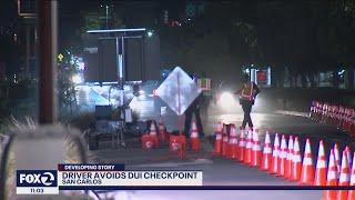 Driver at DUI checkpoint flees from police