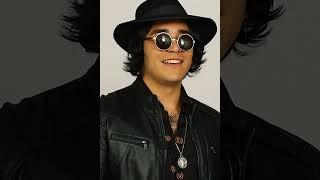 At a studio Adrian Brizz & Lord Zuela are asked to talk about their music producer father