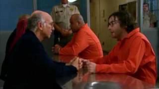 Larry comforts Dr. Bright in prison