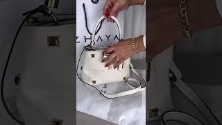 BOLSA TIRACOLO PEQUENA CAROL COURO REBITES