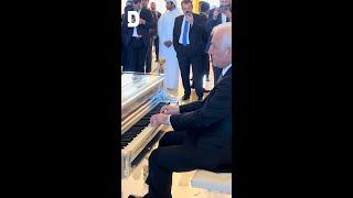 Armenian President playing piano in the lobby area