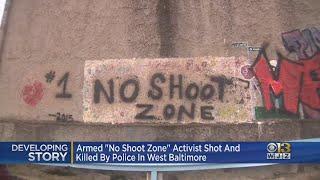 'No shoot zone' activist killed holding knife to female