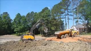 Excavator Loading Out Mud