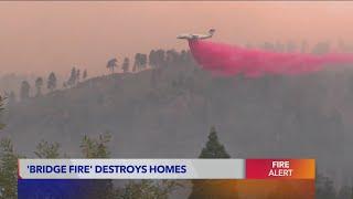 Bridge Fire burns down homes, continues growing with zero containment