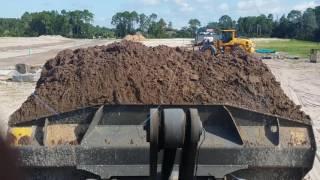 Volvo L90 Loader moving a Stock Pile work video