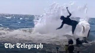 Humpback whale throws snorkeller into the air