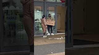 HOMELESS MAN GIVES STACKS OF CASH TO A STRANGER BECAUSE SHE SAVED HIS LIFE!!! #shorts