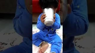 Baby drinking milk in glass #funny #shorts #funnyvideo #cutebaby #babyeating #short