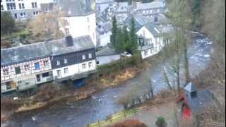 Watching the river flow through Monschau, Eifel region, Germany