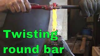 Twisting round bar - ornamental ironwork - basic blacksmithing