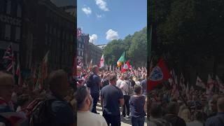 Patriots arriving at London  outside the royal courts of justice