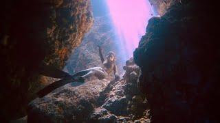 Diving into Darkness: Girl's Courageous Freedive Expedition Through a Cave