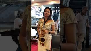 එයත් ලස්සනයි වාදනයත් ලස්සනයි Saxophone playing beautifull Girl in public