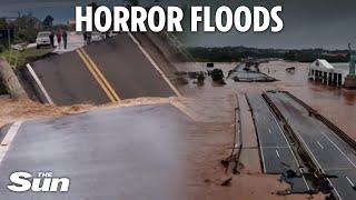 Terrifying moment bridge suddenly cracks and plunges into river in 'biblical' Brazil floods