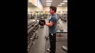 Bicep curling 80 lb dumbbells good form @ 6' 203