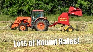 Round Baling Hay and Drifting Tractors