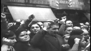 Spanish people gathered during Buenaventura Durruti's funeral procession in Barce...HD Stock Footage