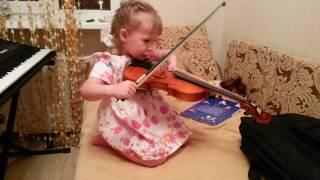 A child playing the violin for three years