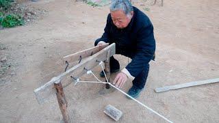 Grandpa Amu uses the ancient method to make hemp rope, a great way